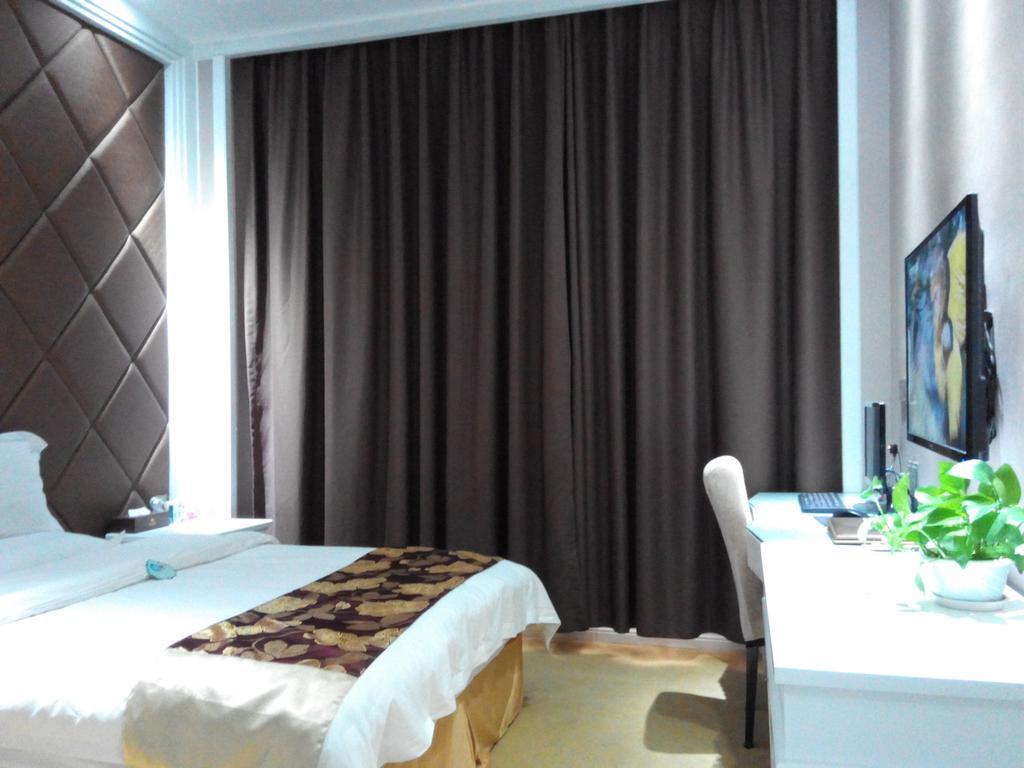 Ge Lin Hotel Szungjang Szoba fotó