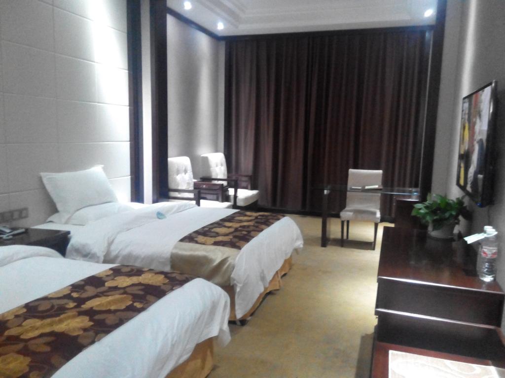 Ge Lin Hotel Szungjang Szoba fotó