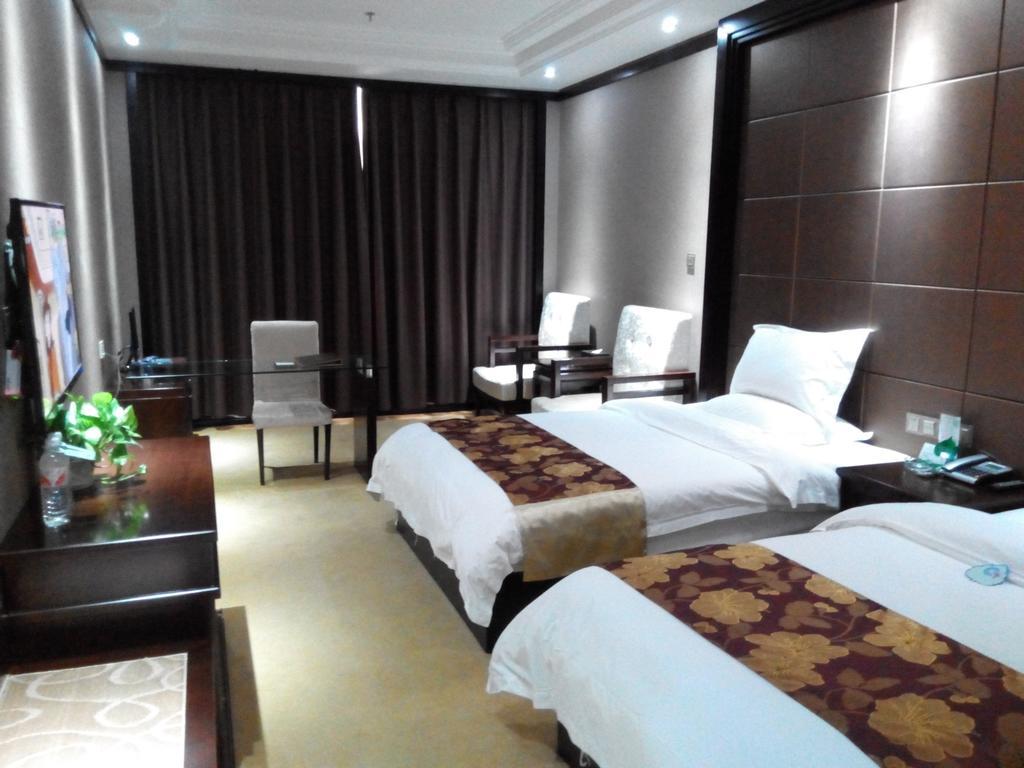 Ge Lin Hotel Szungjang Szoba fotó